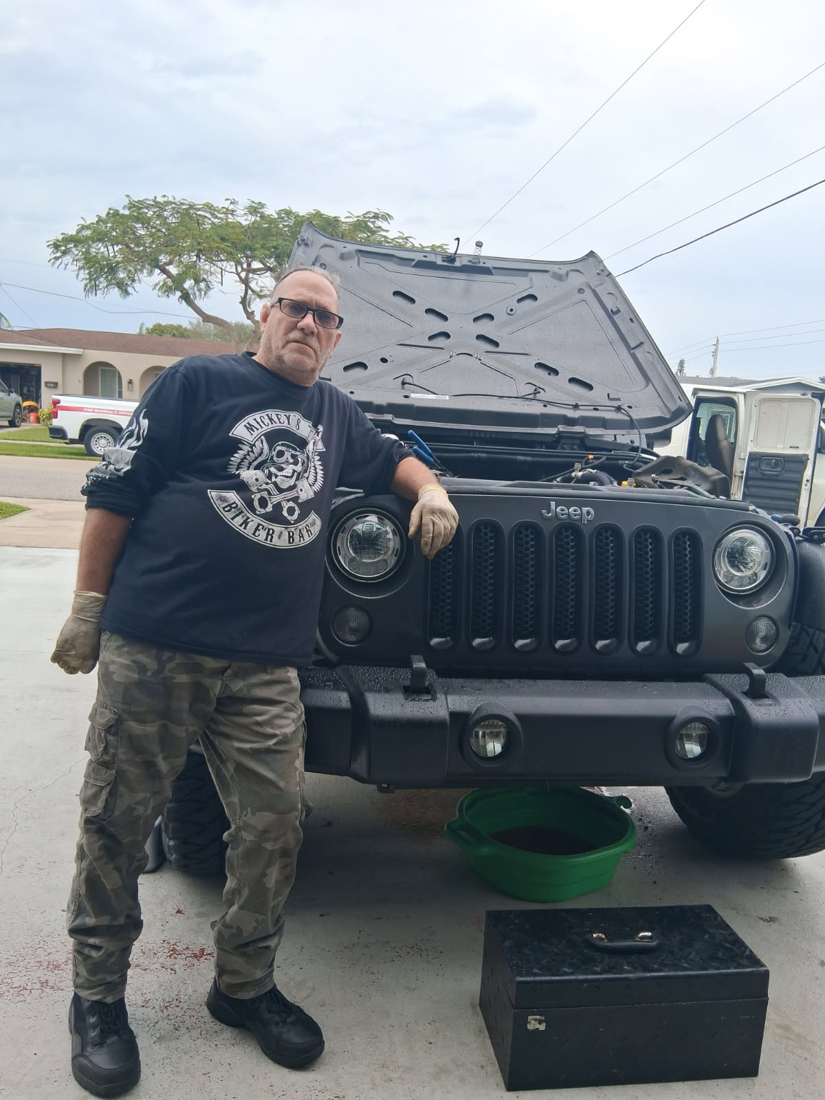 Mechanic on a Jeep service call